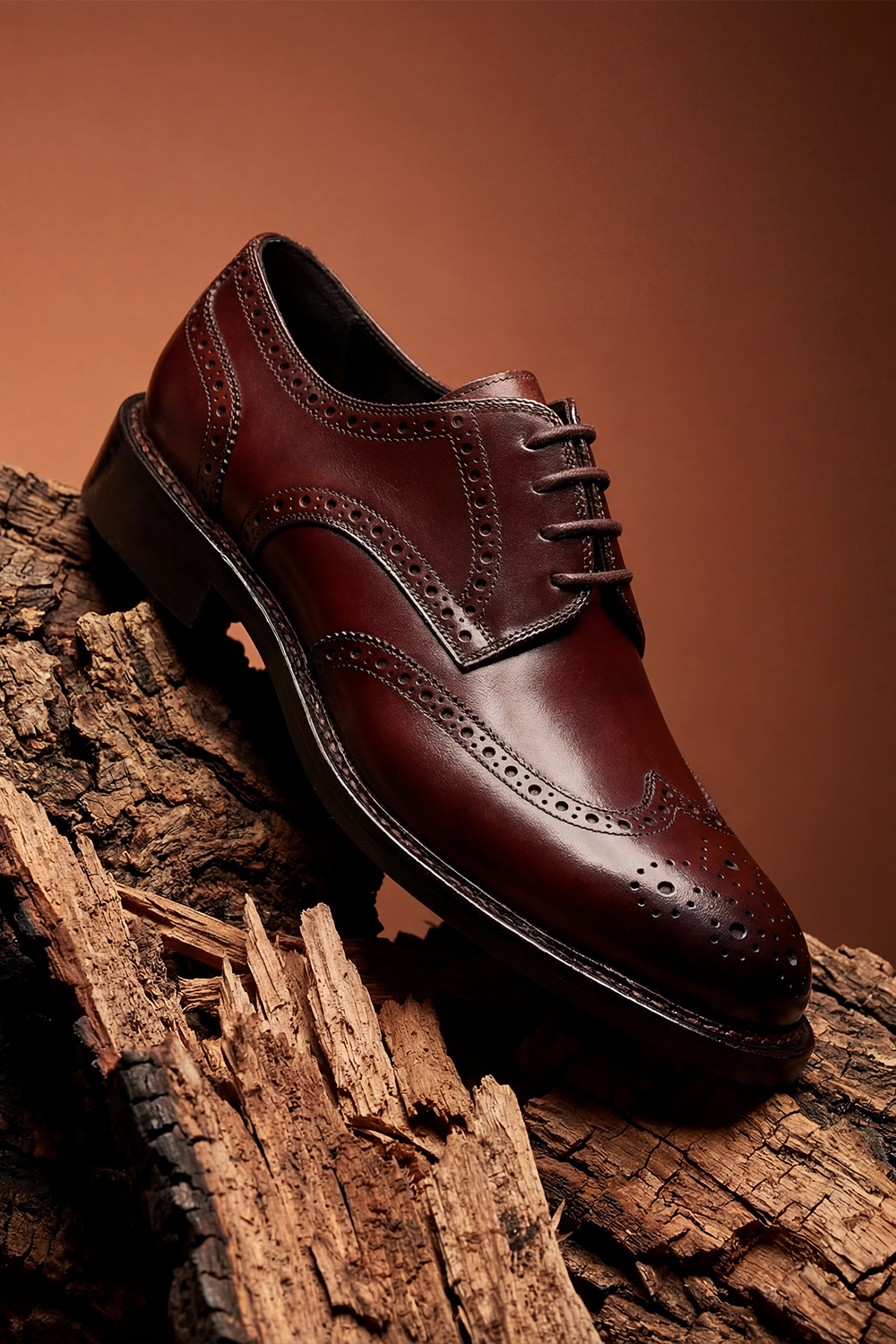 SCARPA DERBY BROGUE IN PREGIATA PELLE SHELL CORDOVAN